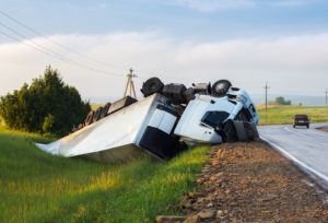 rolled over truck in a ditch 300x204 1