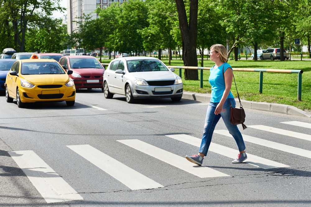 Woman crossing street